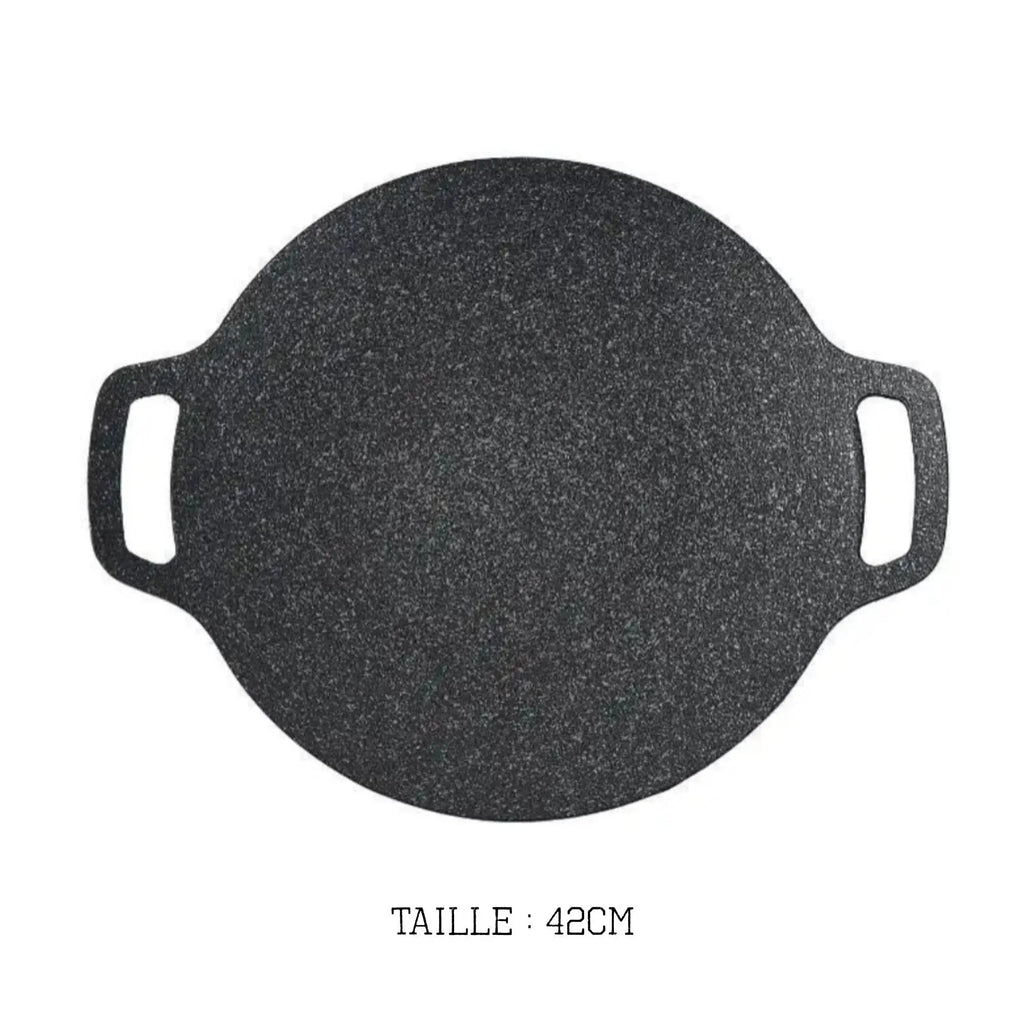 Poêle de cuisson en pierre anti-adhésive extérieure – idéale pour le camping ou la cuisine nomade.