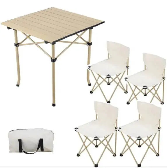 Table pliante en aluminium portable avec quatre chaises pliantes pour le camping et les pique-niques, design léger et compact avec sac de transport.